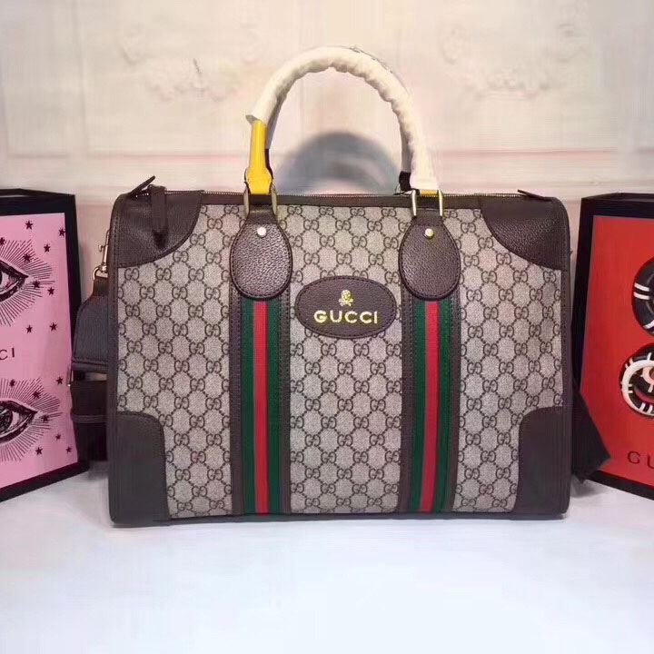 G*u*i top handle bags
